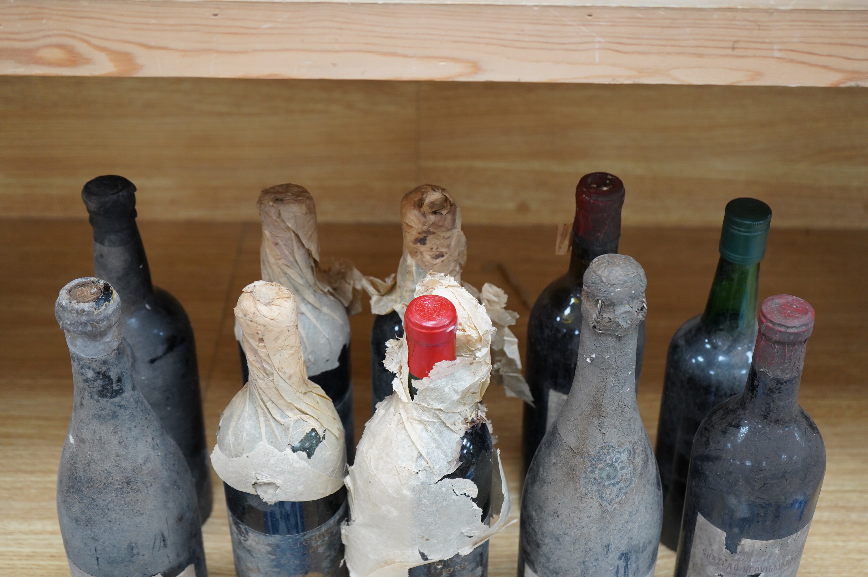 Ten bottles of red wines to include six bottles of mixed Claret/Bordeaux, four bottles Chateau de Ville-George’s, Grand Cru 1959, two bottles of Chateau Leoville Barton 1947 and two others without labels, a bottle Cau de
